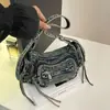 Bolsa Jeans Estilo Europeu Feminina 2026 Novo Tecido Lavável Bolsa de Ombro Único Retro Menina Picante Bolsa Transversal de Grande Capacidade