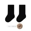 Calcetines para Bebé 2026 Invierno Nuevo Estilo Felpa Engrosados Sin Costuras No Constrictivos Color Sólido Calcetines de Media Pantorrilla para Recién Nacido
