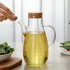 Atacado de fábrica utensílio doméstico de cozinha de vidro para temperos garrafa de óleo Bico de águia à prova de vazamento Óleo de vidro borossilicato alto com escala