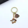 Chaveiro de Cowboy Americano Caçador de Recompensas Cowboy Ocidental Liga de Zinco Carro Bolsa Casal Pingente Acessórios de Pingente
