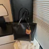 Bolsa tote de gran capacidad para ir al trabajo, bolso de hombro casual para mujer 2026 nuevo primavera/verano, bolso de mano retro popular