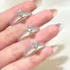 Plata de ley S925, un anillo único y moderno de estilo chino con incrustaciones de jade blanco y diamantes, que irradia una elegancia suave y refinada, un anillo de jade simple con un solo diamante