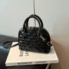 Bolsa Tote Textura Moda Concha para Mulheres Bolsa Xadrez Embossado 2026 Nova Bolsa Simples Casual de Ombro Transversal