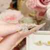 Anillo de Piedra Preciosa Vintage Elegante Color Dorado Camelia Plata S925 Exquisito Brillante Estilo Lujo Ligero Collar y Pendientes