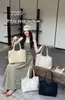 Bolsa Tote Texturizada para Mulheres 2026 Novo Estilo de Luxo Grande Capacidade Fashionável para o Dia a Dia Bolsa de Ombro Versátil Bolsa de Braço