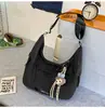 Bolso Casual Simple tipo Bollo 2025 Nueva Moda Bolso de Hombro Textil Gran Capacidad Viaje Commuter Bolso Cruzado Versátil