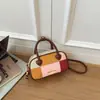 Bolsa de ombro Patchwork camurça bowling 2026 para o dia a dia feminina nova bolsa transversal bolsa de mão com toque de nicho estiloso color blocking