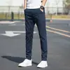 Calças masculinas de outono retas slim fit com stretch nos tornozelos estilo coreano modernas cor sólida casuais calças de verão masculinas