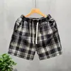 Shorts de pata de gallo para hombre de marca casual de lujo, nuevo estilo verano 2025, shorts de playa rectos holgados de cuatro puntos, pantalones casuales retro