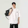 Casual Versátil Tendência Marca High Street Masculina Estilo Americano Moda Verão Camisa Solta de Manga Curta Camisa Artística com uma Vibe Elegante