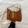 Bolsa de designer nicho estilo coreano para mulheres, novo modelo primavera-verão 2026, bolsa de mão texturizada, bolsa de ombro versátil e elegante
