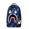 Mochila de tiburón con estampado de grafiti de moda transfronteriza, bolsa casual de gran capacidad para estudiantes commuters y escolares al por mayor