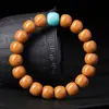 Pulsera de Cuentas de Cabeza de Mono de Material Llama de Dragón Premium, Cuentas Perfectamente Redondas Brillantes, Pulsera Budista Suave Envuelta en el Dedo para Hombre Retorcida a Mano Venta al por Mayor