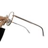 Gafas para miopía retro Montura redonda Gafas lisas para mujer T8855 Montura de aleación ultraligera Montura pequeña para cara pequeña Venta al por mayor