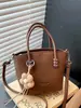 Bolsa de Cubo de Mano de Alta Gama Elegante de Comercio Exterior para Mujer 2026 Nuevo Bolso Cruzado de Hombro Único de Moda para el Trabajo