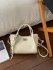 Exquisita y Compacta Bolsa Cesta de Verduras para Mujer 2026 Primavera Nueva Bolso de Hombro Cruzado de Cuero Suave Bolso de Mano para Viajes Diarios Bolso Cubo