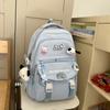 Mochila escolar de estudiante de secundaria de alto valor para estudiante universitaria estilo coreano versátil de gran capacidad para computadora y viajes mochila de estudiante de secundaria moderna