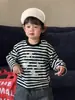 Ropa para Niños Conjunto de Otoño para Bebé 2026 Nuevo Estilo Coreano Ropa Infantil Conjunto de Camiseta a Rayas de Manga Larga y Jeans para Niños