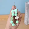 Chaveiro Ins Pequeno Fresco Cor Doce Banhado com Contas Laço Coração Chaveiro Decoração de Bolsa Pingente Pequeno