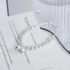 Fujian y Guangdong Plata de Ley 925 Plata Rota Perla de Imitación Pulsera de Campana para Mujer Ins Simple Nicho Moda de Gama Alta Exquisita Pulsera