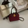 Bolso de hombro nuevo, elegante y versátil 2026, un bolso de mano mate de alta gama, de nicho, bolso de axila y bolso cruzado