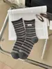 Calcetines de tela retro a rayas para otoño e invierno para mujer, hasta la pantorrilla, calcetines apilados con borde enrollado estilo coreano, versátiles, transpirables, cálidos, calcetines de moda