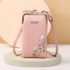 Suministro de fábrica 2024 nuevo bolso para teléfono móvil para damas moda coreana patrón lichi color sólido bordado bolso bandolera diagonal