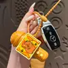 Nuevo llavero divertido de micrófono de grabación, lindo juguete de panda de dibujos animados tocando música, colgante para bolsa de estudiante
