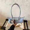 Bolsa baguette de camurça vintage de alta qualidade para mulheres, nova bolsa de ombro/axila de moda de nicho 2026, bolsa de mão para o dia a dia