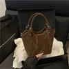 Bolsas Transfronterizas para Mujer 2025 Otoño Estilo Coreano Moda Trendy Bolso Cubo Casual para el Trabajo y los Viajes Bolso Cruzado de Alta Gama