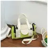 2026 Nuevo Bolso Redondo Cilíndrico de Bloques de Color de Moda Bolso de Mano Hombro Cruzado Bidireccional Multifuncional Casual Versátil para el Trabajo Bolso de Mujer Bolso de Mamá