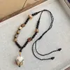 Colar Longo Trançado com Pingente de Bolota Pequena Estilo Étnico Retrô para Mulheres, Acessório Único e Sofisticado, Simples e Versátil