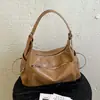 Bolso de axila de diseño de nicho para mujer transfronterizo, bolso tipo empanada multi-bolsillo para el día a día, bolso versátil y de moda para hombro y crossbody