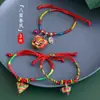 2025 Novo Festival do Barco-Dragão Pulseira de Corda Colorida para Adultos, Crianças e Bebês Pulseira Vermelha Feita à Mão Pequeno Zongzi Atacado