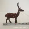 Animal de simulación ciervo sika simulación alce jirafa modelo animal de piel accesorios de decoración para cine y televisión venta al por mayor