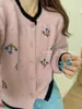 Nuevo cárdigan suéter de punto tejido a mano con flor de ganchillo de contraste vintage para otoño e invierno, chaqueta de punto suave y cerosa de estilo suelto y suave para mujer