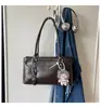 Bolso tote de nicho de alta gama estilo coreano 2026 para mujer, gran capacidad, bolso de hombro para ir al trabajo, bolso de mano moderno y versátil
