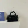2026 Otoño Nuevo Estilo Coreano Retro Bolso de Hombro de Moda Más Vendido Color Sólido para Viajes Diarios Bolso Cruzado Tipo Cubo