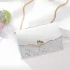 Bolsos 2025 Bolsos Nuevos para Mujer Otoño e Invierno Bolsos Cruzados de Moda Versátiles Tendencia Diseño de Nicho Cadena de Cuero Genuino Estilo Caliente Pequeño Cuadrado