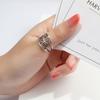 Zhenrong deseo venta caliente Nuevo anillo de flor hueca Europeo y Americano Comercio exterior retro Plata tailandesa negro anillo de compromiso para mujeres