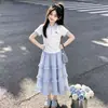 Verano 2026 Nuevo Estilo Camisa Polo Manga Corta Estilo Universitario Coreano para Niñas Falda de Encaje Dulce y Linda Conjunto de Dos Piezas
