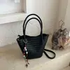 Bolso Shuai Mi Jia, color liso, elegante, nuevo modelo 2026, bolso de hombro casual, bolso de axila de moda, bolso cubo tejido para el día a día