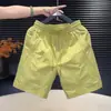 Moda de verano para hombre, personalidad, estilo páramo, pantalones cortos versátiles para hombres jóvenes, pantalones cortos de color liso en capas para exteriores, frescos