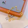 Pulseira de Trevo de Quatro Folhas Vazada com Pedras Inteiras Estilo Xiaohongshu para Mulheres, Nova Joia de Mão Elegante Empilhada de Alto Padrão Estilo Chinês Acessível