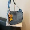 Bolsa feminina transfronteiriça 2026 novo modelo pequena mochila em jeans lavado, estilosa e simples, de ombro único cruzada, bolsa moderna e versátil