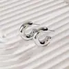 Pendientes de Botón Geométricos Personalizados Ins Transfronterizos Europeos y Americanos Hebilla de Oreja Martillada de la Corte Francesa Pendientes Irregulares Retorcidos