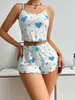 Conjunto de dos piezas para mujer, tank top fino sin mangas y shorts con estampado de corazón, lindo conjunto para estar en casa