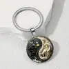 Llavero Redondo de Aleación para Hombre con Patrón de Dragón Blanco y Negro de Vidrio Transfronterizo Regalo de Aniversario Joyería al por Mayor