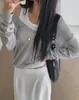 Enviado desde Corea, chic verano nuevo estilo ins semitransparente fino cuello en V protección solar relajado manga larga tejido