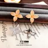 Pendientes de Botón de Flor Completamente Incrustados de Diamantes de Lujo Ligero Europeo y Americano, de Nicho, Modernos y Únicos, Pendientes Audaces y Elegantes con Exquisito Diseño de Artesanía